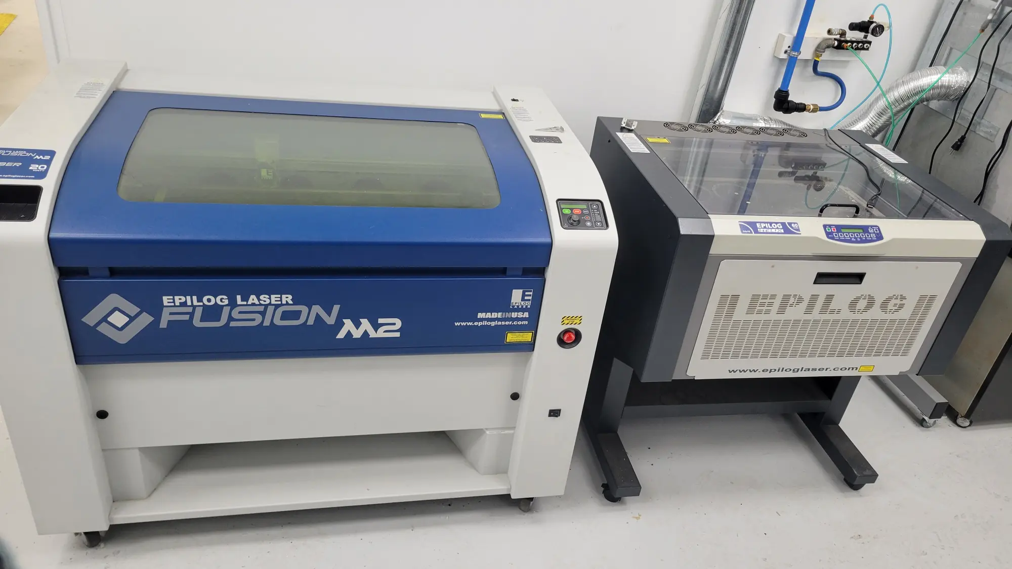 An image of an Epilog Laser Fusion M2 and an Epilog Helix