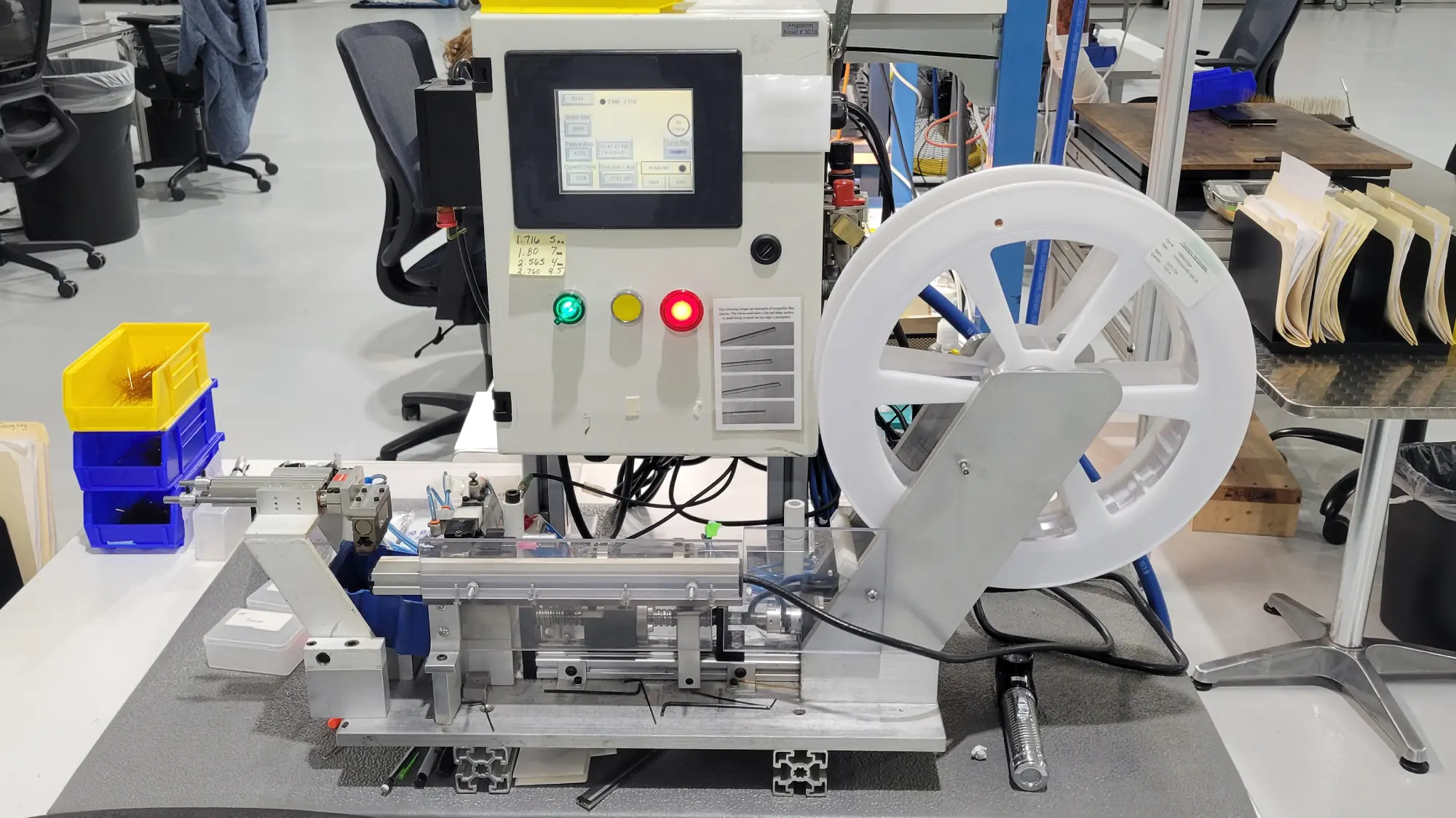A picture of a custom built fiber optic cutting machine