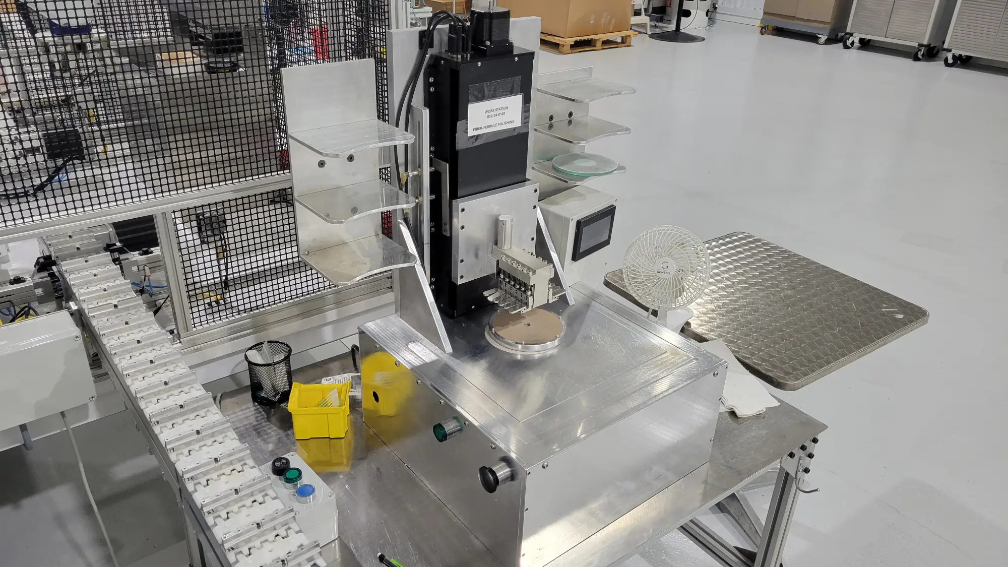 A picture of a custom built fiber optic cutting machine